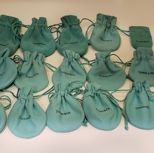 15 Tiffany & Co. Jewelry pouches.